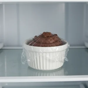 Chocolate cottage cheese mousse chilling in refrigerator before serving

