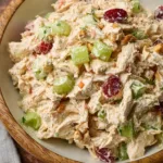 High protein chicken salad with fresh vegetables and dressing