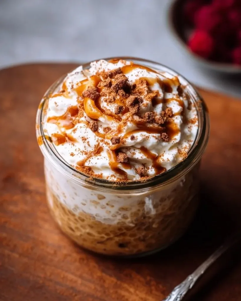 Bowl of high-protein overnight oats topped with fruits and nuts