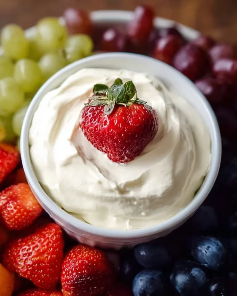 Delicious marshmallow cream cheese fruit dip served with fresh fruit