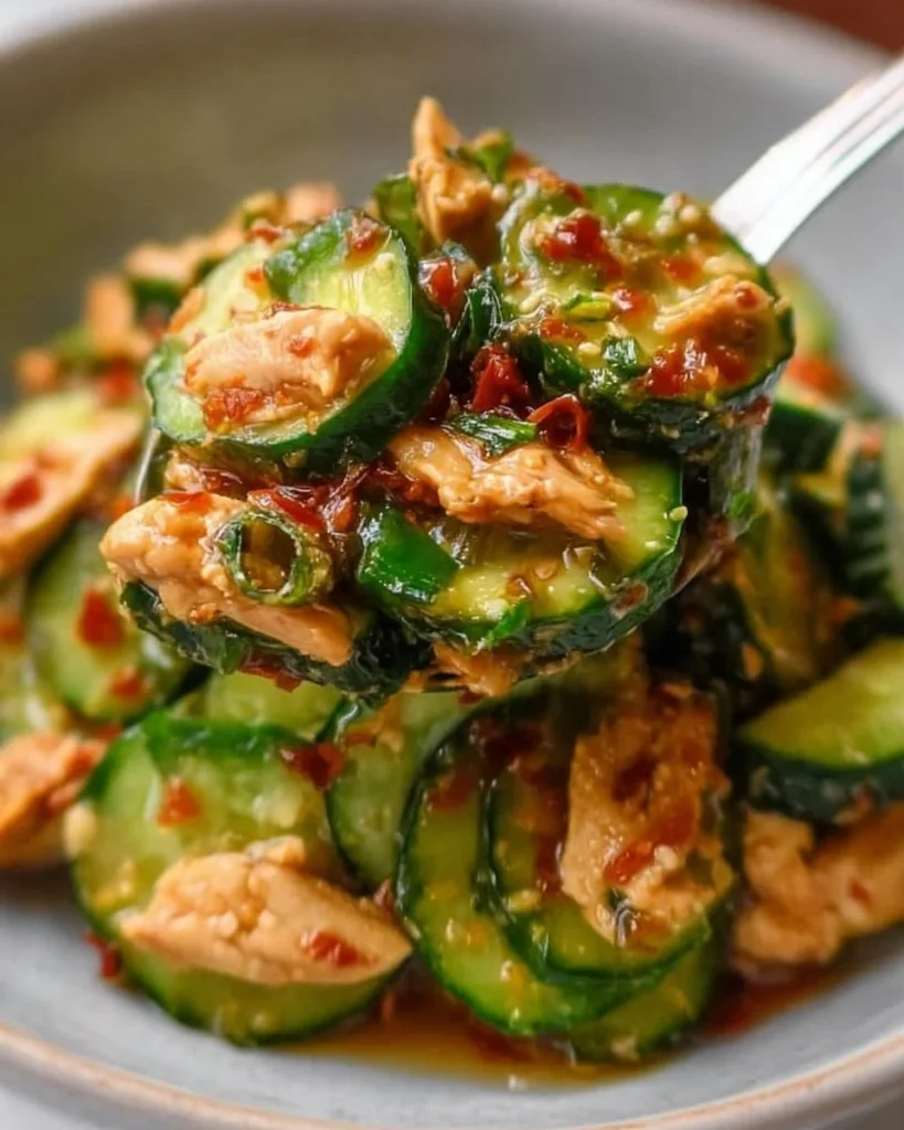Fresh Thai Cucumber Salad with Chicken, herbs, and vibrant vegetables